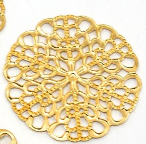 filigrana traforata in metallo oro