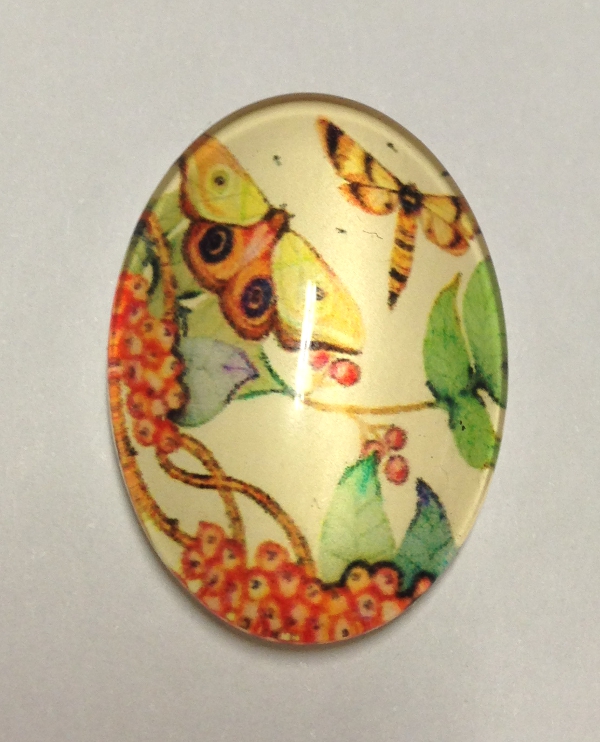 cabochon in vetro ovale con farfalle