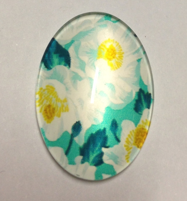 cabochon in vetro ovale con fiori bianchi