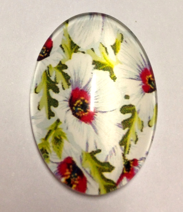 cabochon in vetro ovale con camelie 