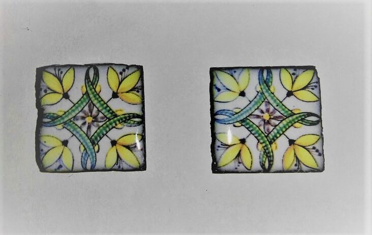 piastrella in pietra lavica con maiolica gialla